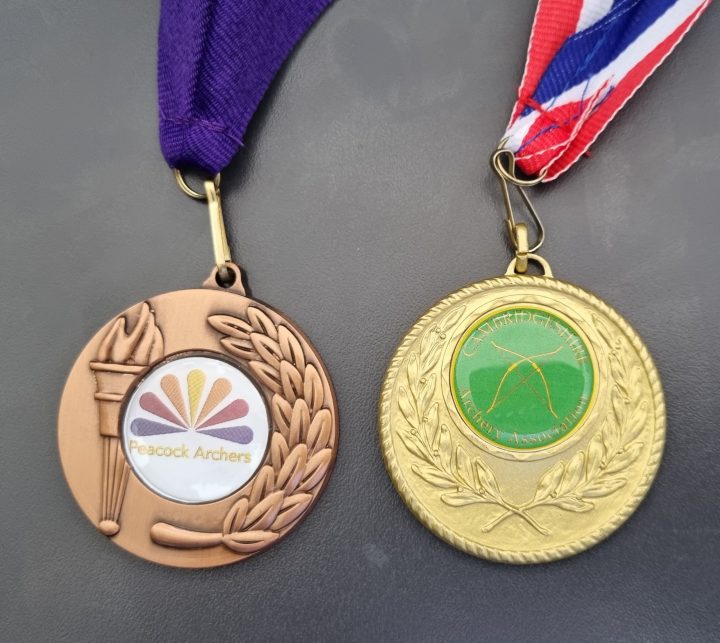 WA Peacock Archery Medal and CAA Meda